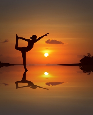 “Silhouette Woman Doing Yoga” by ponsuwan