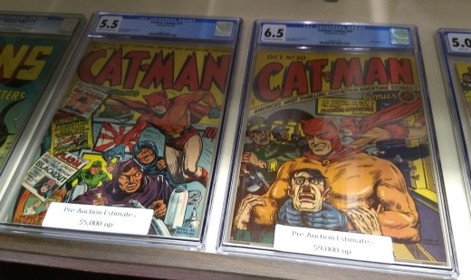 Two early issues of Cat-Man, a 1940s knock-off of Bat-Man. No relation to the current DC Comics' character Catman.