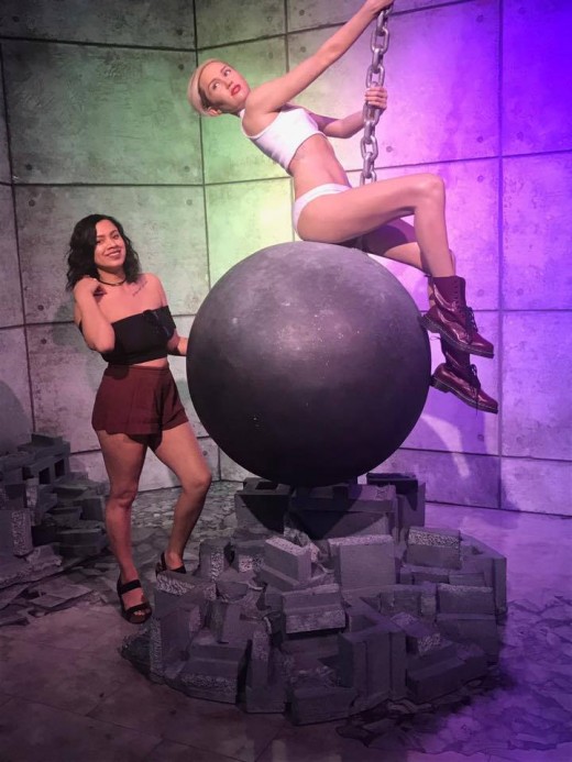 This is me with Miley Cyrus at Madame Tussauds in Las Vegas. I found a deal for tickets on groupon. Score!