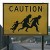 This infamous road sign warns US motorists to watch out for Mexican illegal families fleeing across I-5 Credit to Earnie Grafton, Union Trb.
