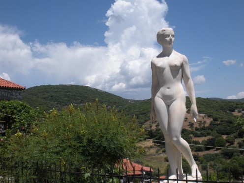 Female Statue, as I was walking down the lane in a small village in Greece. Wish I knew the story behind it. 