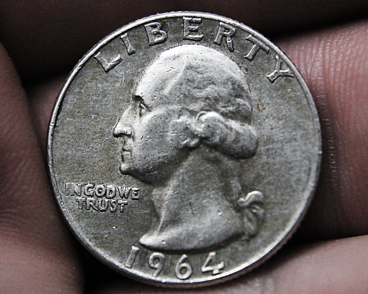 This is a photo of the 1964 silver Washington Liberty quarter. It was the last year of the 90 percent silver coin. Quarters are now made of copper and nickel.  
