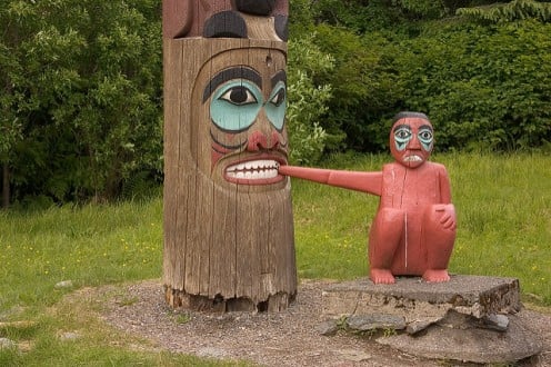 Carved cedar pole at Saxman Native Village Park. This is a quite unusual carving.
