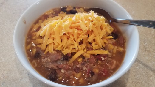 If cooking on the stove, mix and cook together over medium heat for about 30 minutes. I made mine in my Instant Pot set to 10 minutes. Top with tons of shredded cheese. Yum!
