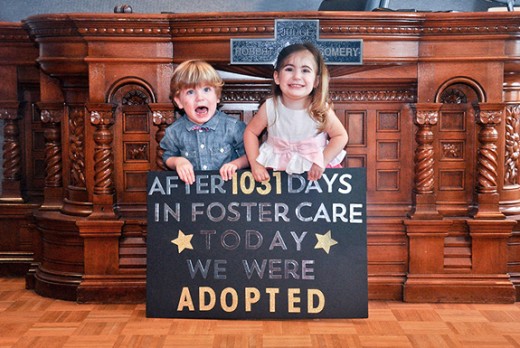 A very heart warming photo of a daily accurance.  Adoption.
