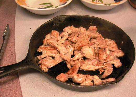 Stir fried chicken makes a great topper for a bed of rice.