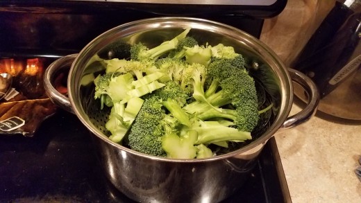 While your mushrooms are cooking, chop your broccoli and get it started steaming on the stove.