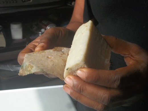 Wax being peel off cooked yam