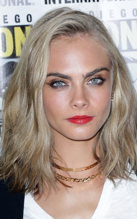 Cara's eyes are light blue, but iridescent. They are greeny, grey, bluey!