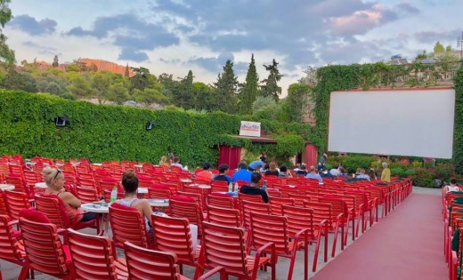 Watching a movie under the starry sky is a must include in every itinerary of Athens.