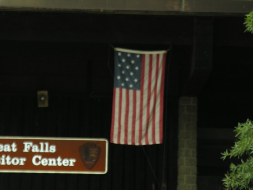 American Flag at the Great Falls Visitor's Center with 15 stars and 15 stripes.  July 2017.