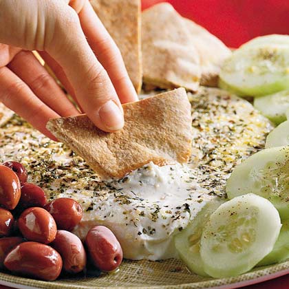 Yogurt as a dip for pita, olives, cucumbers, tomatoes, spices optional