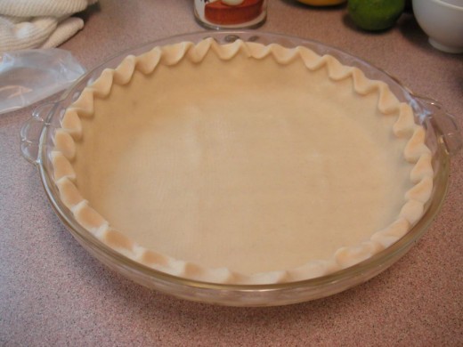 The crust has to be baked before filling with the pudding.