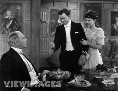John Clements and June Duprez confronting C. Aubrey Smith