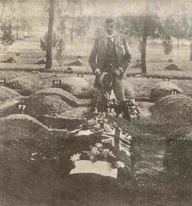 Major J.F. Thomas  standing over the grave of Harry Harbord ‘Breaker’ Morant and Peter Handcock, 1902. 
