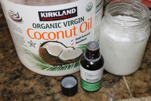 Ingredients for homemade toothpaste featuring an optional essential oil 