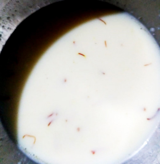 Condensed creamy milk for putting sugar syrup dipped cheese balls