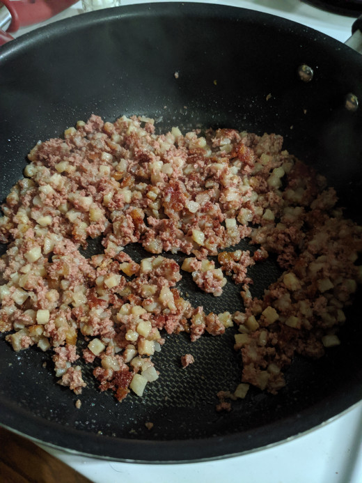 Let cook for 12 minutes, then stir. See how the corned beef has a crispiness to it
