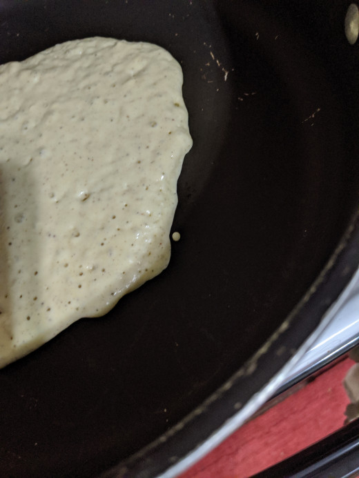 The pancake will bubble and the edges turn dry