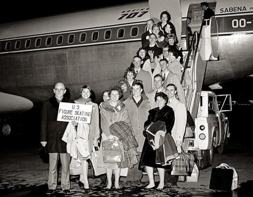 The 1961 U.S. Figure Skating Team boarding the plane that would crash and kill all on board. Behind the sign is Laurence Owen, who just two days earlier graced the cover of Sports Illustrated as "America's most exciting girl skater".