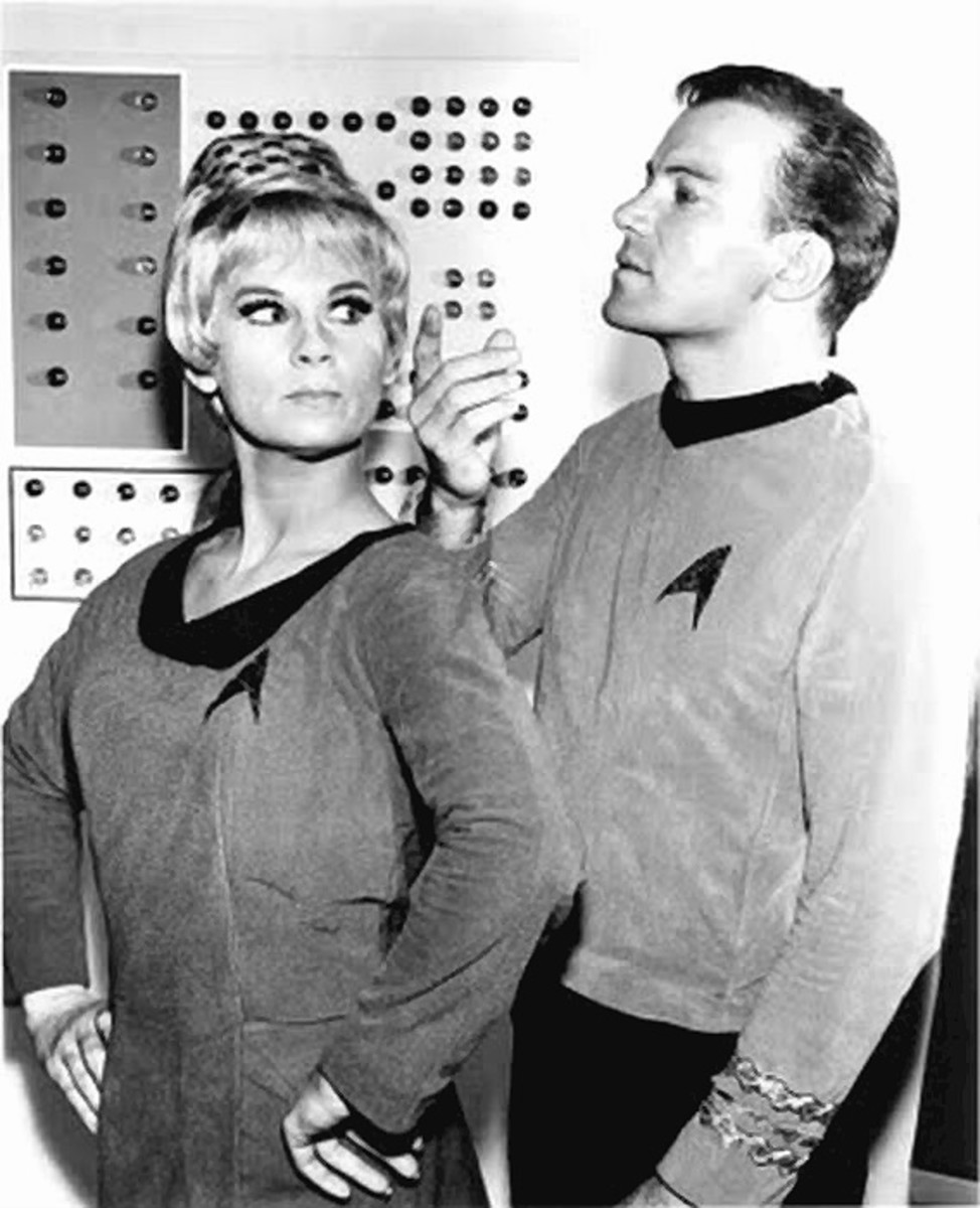 Captain James T. Kirk (William Shatner) and Yeoman Janice Rand (Grace Lee Whitey).