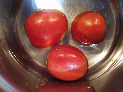 Take 2-3 medium sized tomatoes in a vessel. Add 1 cup of water.
