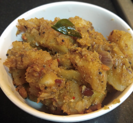 Serve hot with rice, chapati, roti, paratha or poori.