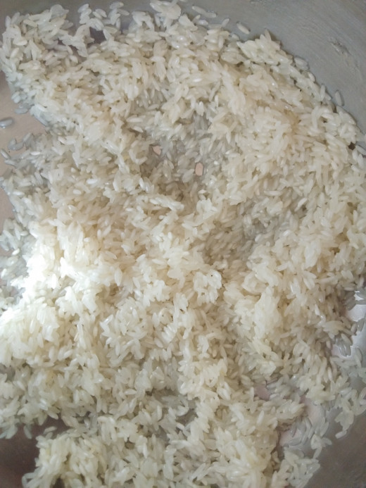 Rinse rice until water runs clear (atleast 3 times).  Drain water and keep aside.