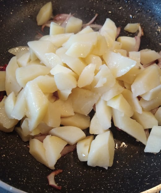 Now add cooked potatoes.