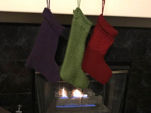 Here is an image of the Christmas stockings I made. They are basic, but we still loved them. Can’t wait to start all over – trying new patterns and colors this time!