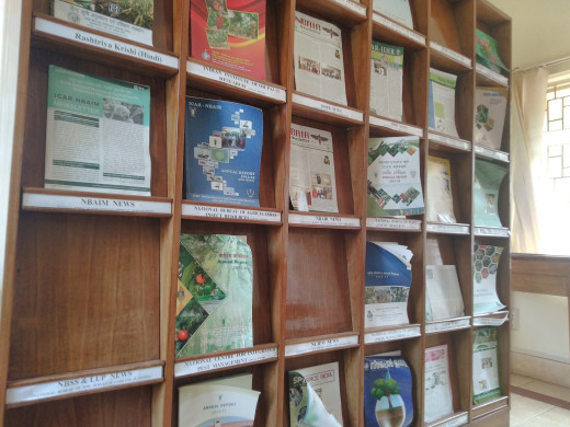 Volumes of agricultural magazines on a library shelf