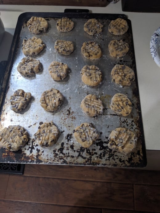 Spread out on pan. I started with 5 rows of four cookies, but they didn't spread, so I placed them tighter. 8 rows of four.