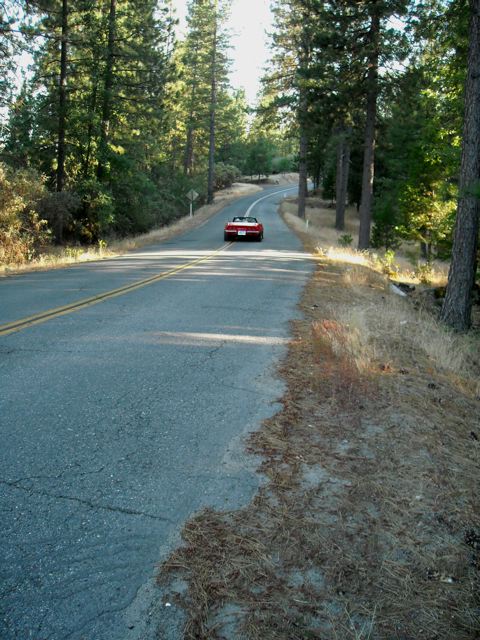 This red Corvette passed me so fast one day, I almost missed the shot. Traffic is light here... and no traffic lights.