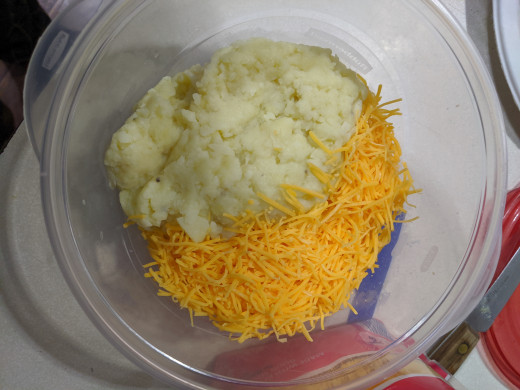 Add shredded cheese. I used sharp cheddar.
