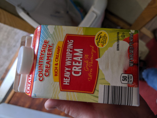 Put heavy cream in can