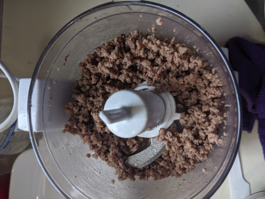 shred hamburger in mini prep processor, place in bottom of small casserole dish