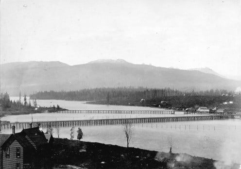  Looking west across False Creek from 7th Avenue and Birch Street Vancouver. Panoramic view showing Granville Street Bridge and the C.P.R. Kitsilano Trestle Bridge, circa 1890