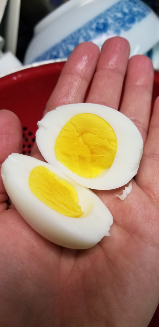 perfectly cooked egg! If you want your yolk cooked just a bit more, add a little bit of time to the boiling part. 