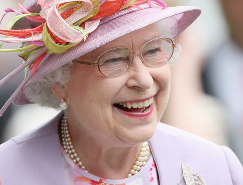 HM Queen Elizabeth II laughs in the parade ring on day four of Royal Ascot 2009 at Ascot Racecourse in Ascot, England.  ( CHRIS JACKSON, GETTY IMAGES / June 19, 2009 ) 