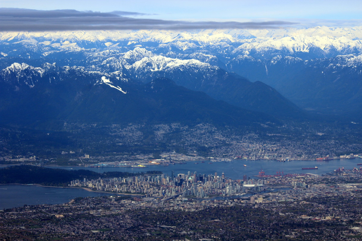 Aerial view of Vancouver and the Coast Mountains taken from a flight leaving the Vancouver Int'l Airport.