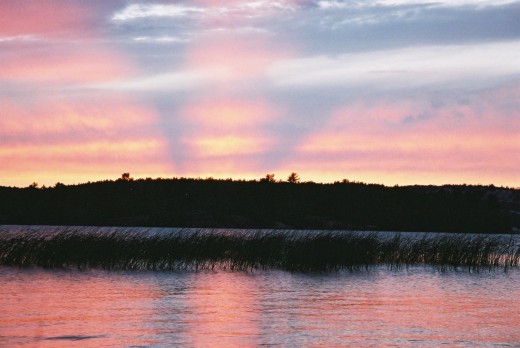 I love colours. This was a sunset on the Georgian Bay in Ontario. One can always count on the sun and water to give off a good photo in terms of colours at least.  