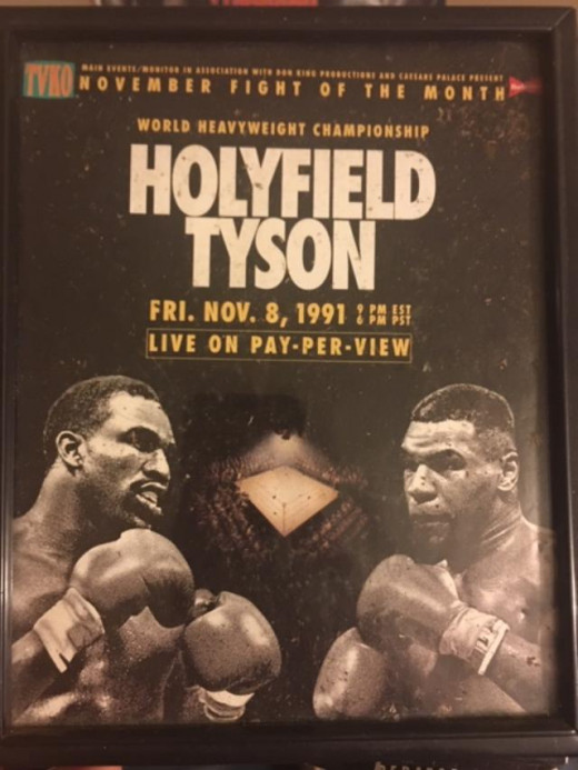 The original bout was suppose to take place in 1991, like this poster shows. The fight did not take place until 1996.