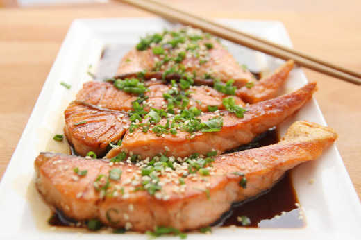 Eat Salmons to gain weight. It is a great source of proteins. 