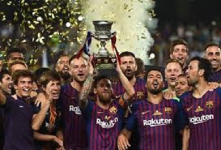 FC Barcelona Footballer's holding Cup