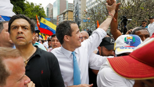 Opposition political leader Juan Guaido greets supporters during a march before it was blocked by police in Caracas, Venezuela, Tuesday, March 10, 2020. Guaido called for the march aimed at retaking the National Assembly legislative building, .....
