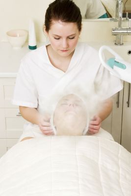 A woman receives a steam treatment!
