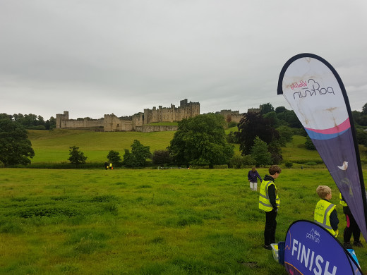 The Pastures parkrun with the backdrop of Alnwick Castle