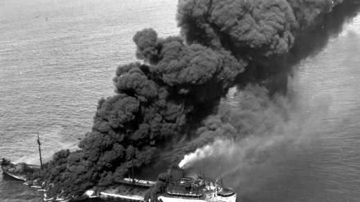 A burning merchant ship during the Battle of the Atlantic. 