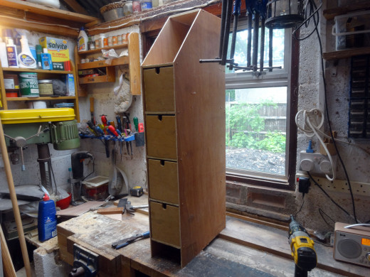 Once the drawer unit is made, measure the space below the bottom drawer support for cutting and fitting the plinth; using an off-cut from the salvaged 18mm plywood.