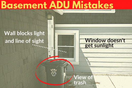 Basement ADU Mistakes - basement window that gets no light, has a blocked line of sight, and is right by the trash